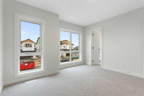 125 Southborough Common, Cochrane, AB - Indoor Photo Showing Other Room