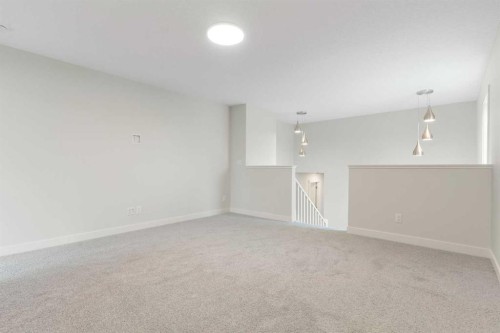 125 Southborough Common, Cochrane, AB - Indoor Photo Showing Other Room