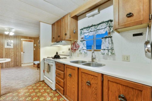 603 Alberta Avenue, Carmangay, AB - Indoor Photo Showing Kitchen With Double Sink