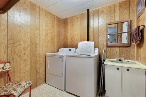 603 Alberta Avenue, Carmangay, AB - Indoor Photo Showing Laundry Room