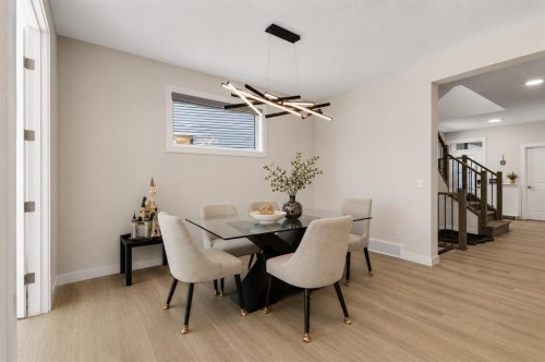 61 Rowmont Heath Nw, Calgary, AB - Indoor Photo Showing Dining Room