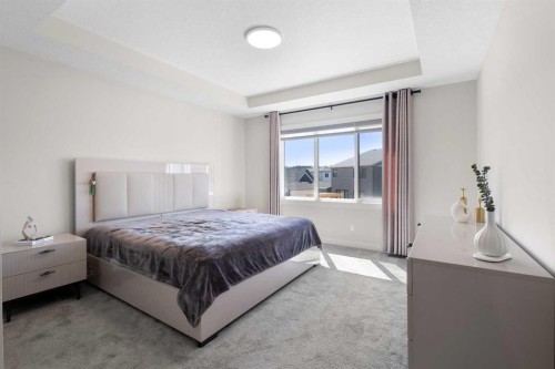 61 Rowmont Heath Nw, Calgary, AB - Indoor Photo Showing Bedroom