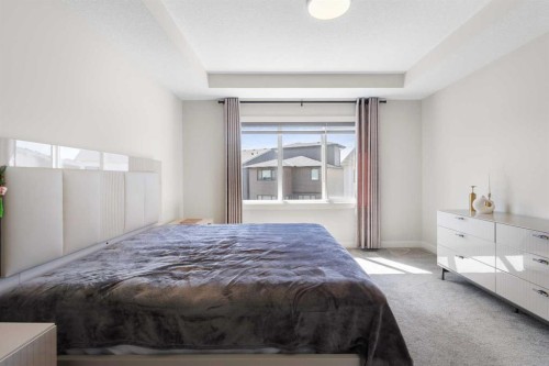 61 Rowmont Heath Nw, Calgary, AB - Indoor Photo Showing Bedroom