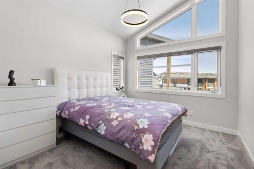 61 Rowmont Heath Nw, Calgary, AB - Indoor Photo Showing Bedroom