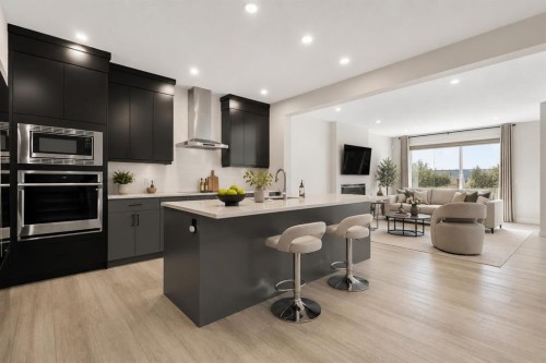61 Rowmont Heath Nw, Calgary, AB - Indoor Photo Showing Kitchen With Upgraded Kitchen