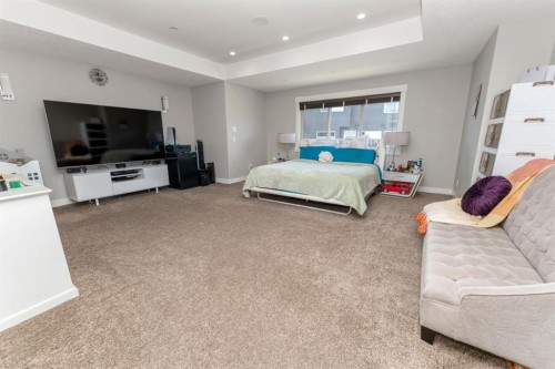 249 Kinniburgh Boulevard, Chestermere, AB - Indoor Photo Showing Bedroom