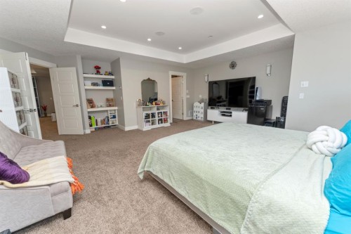 249 Kinniburgh Boulevard, Chestermere, AB - Indoor Photo Showing Bedroom
