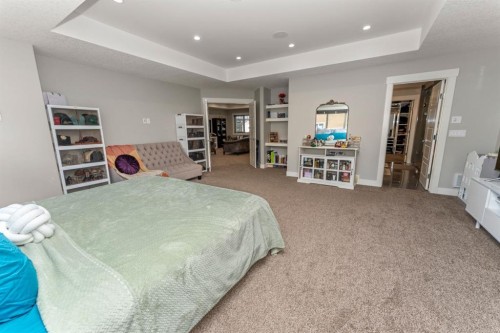 249 Kinniburgh Boulevard, Chestermere, AB - Indoor Photo Showing Bedroom