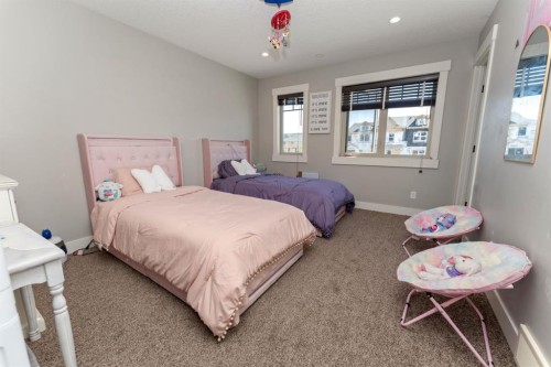 249 Kinniburgh Boulevard, Chestermere, AB - Indoor Photo Showing Bedroom