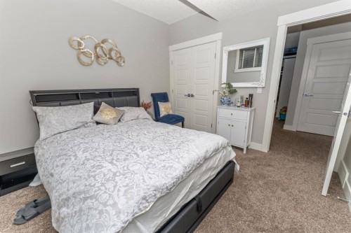 249 Kinniburgh Boulevard, Chestermere, AB - Indoor Photo Showing Bedroom