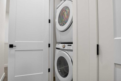 4907 Bowness Road Nw, Calgary, AB - Indoor Photo Showing Laundry Room