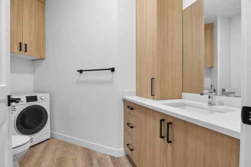 4907 Bowness Road Nw, Calgary, AB - Indoor Photo Showing Laundry Room
