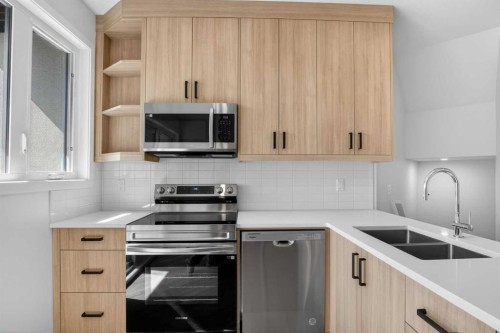 4907 Bowness Road Nw, Calgary, AB - Indoor Photo Showing Kitchen With Double Sink With Upgraded Kitchen
