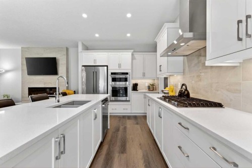 1949 Mahogany Boulevard Se, Calgary, AB - Indoor Photo Showing Kitchen With Stainless Steel Kitchen With Double Sink With Upgraded Kitchen