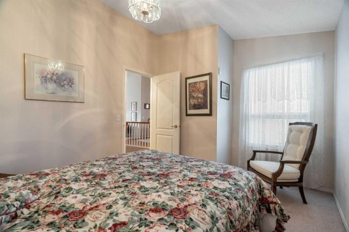58 Evergreen Bay Sw, Calgary, AB - Indoor Photo Showing Bedroom