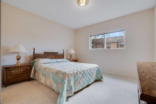 58 Evergreen Bay Sw, Calgary, AB - Indoor Photo Showing Bedroom