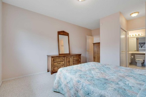 58 Evergreen Bay Sw, Calgary, AB - Indoor Photo Showing Bedroom