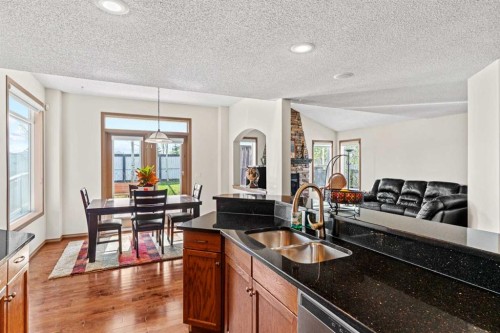 90 New Brighton Manor Se, Calgary, AB - Indoor Photo Showing Kitchen With Double Sink