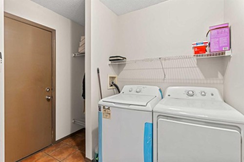 90 New Brighton Manor Se, Calgary, AB - Indoor Photo Showing Laundry Room