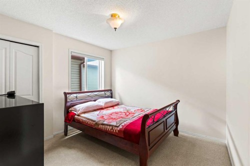 90 New Brighton Manor Se, Calgary, AB - Indoor Photo Showing Bedroom