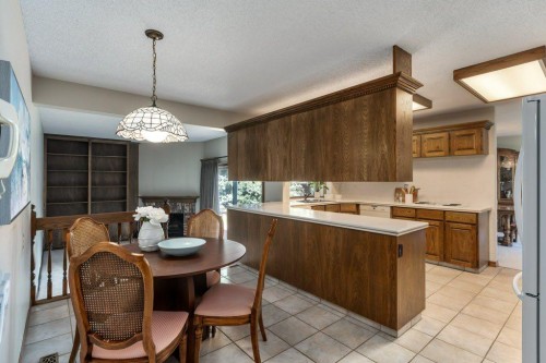 152 Coach Grove Place Sw, Calgary, AB - Indoor Photo Showing Dining Room