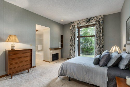 152 Coach Grove Place Sw, Calgary, AB - Indoor Photo Showing Bedroom