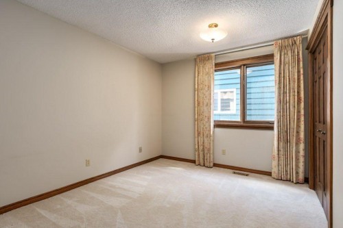 152 Coach Grove Place Sw, Calgary, AB - Indoor Photo Showing Other Room