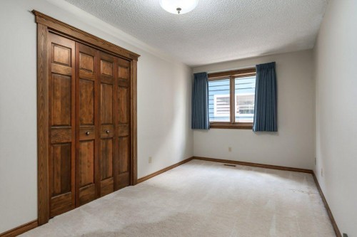 152 Coach Grove Place Sw, Calgary, AB - Indoor Photo Showing Other Room