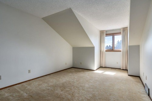 152 Coach Grove Place Sw, Calgary, AB - Indoor Photo Showing Other Room