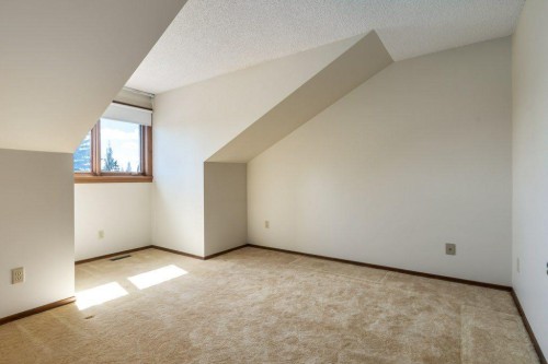 152 Coach Grove Place Sw, Calgary, AB - Indoor Photo Showing Other Room