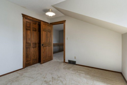 152 Coach Grove Place Sw, Calgary, AB - Indoor Photo Showing Other Room