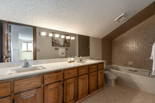 152 Coach Grove Place Sw, Calgary, AB - Indoor Photo Showing Bathroom