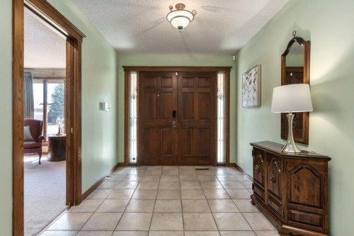 152 Coach Grove Place Sw, Calgary, AB - Indoor Photo Showing Other Room
