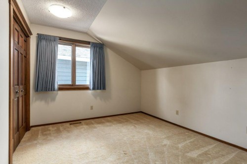 152 Coach Grove Place Sw, Calgary, AB - Indoor Photo Showing Other Room
