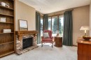 152 Coach Grove Place Sw, Calgary, AB  - Indoor Photo Showing Living Room With Fireplace 