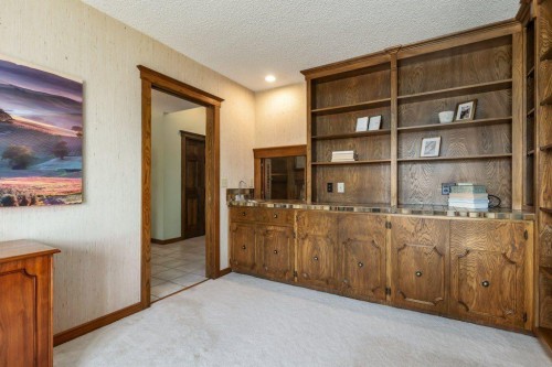 152 Coach Grove Place Sw, Calgary, AB - Indoor Photo Showing Other Room