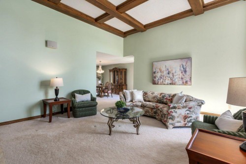 152 Coach Grove Place Sw, Calgary, AB - Indoor Photo Showing Living Room