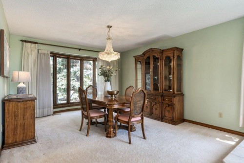 152 Coach Grove Place Sw, Calgary, AB - Indoor Photo Showing Dining Room