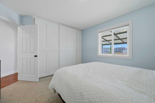 55 Ross Place, Crossfield, AB - Indoor Photo Showing Bedroom