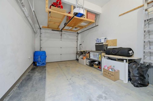 55 Ross Place, Crossfield, AB - Indoor Photo Showing Garage