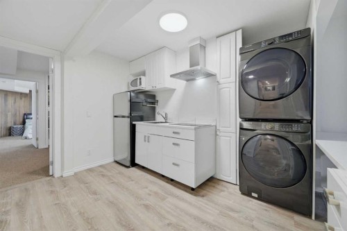 55 Ross Place, Crossfield, AB - Indoor Photo Showing Laundry Room