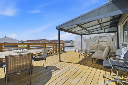 55 Ross Place, Crossfield, AB - Outdoor With Deck Patio Veranda With Exterior