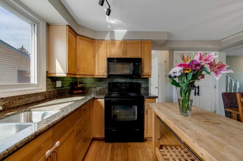 34 Ranch Glen Drive Nw, Calgary, AB - Indoor Photo Showing Kitchen With Double Sink