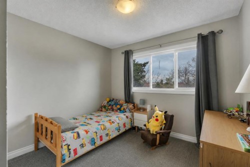 34 Ranch Glen Drive Nw, Calgary, AB - Indoor Photo Showing Bedroom