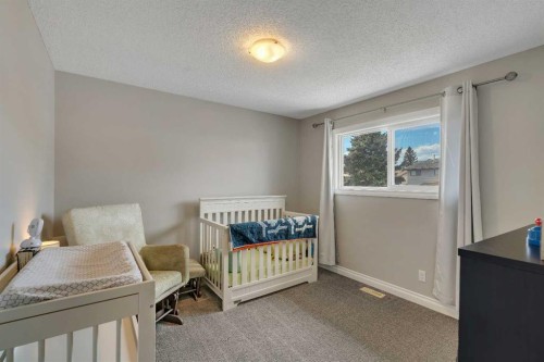 34 Ranch Glen Drive Nw, Calgary, AB - Indoor Photo Showing Bedroom