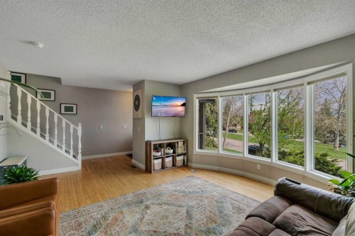 34 Ranch Glen Drive Nw, Calgary, AB - Indoor Photo Showing Living Room