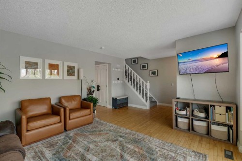 34 Ranch Glen Drive Nw, Calgary, AB - Indoor Photo Showing Living Room