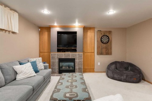 83 Citadel Meadow Grove Nw, Calgary, AB - Indoor Photo Showing Living Room With Fireplace