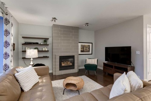 83 Citadel Meadow Grove Nw, Calgary, AB - Indoor Photo Showing Living Room With Fireplace