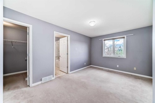 156 Simcoe Place Sw, Calgary, AB - Indoor Photo Showing Other Room